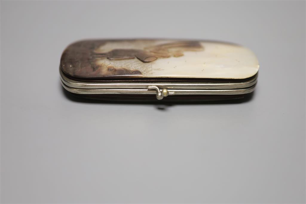 A 19th century mother of pearl figuratively carved purse/case, height 12cm